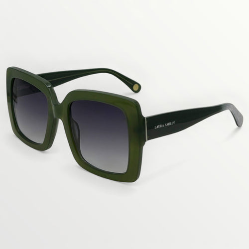 Green sunglasses with a gradient lens on a white background