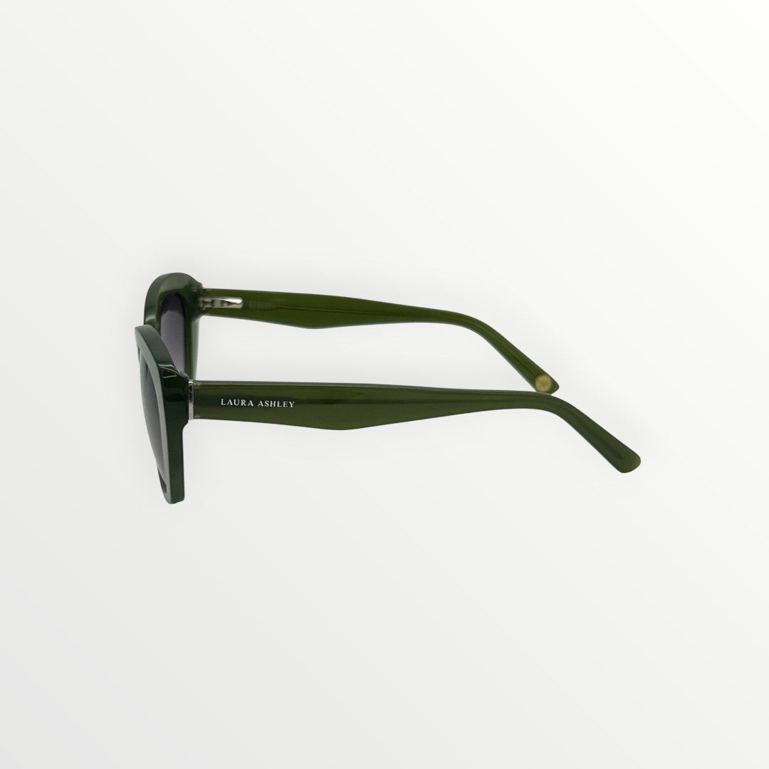 Sunglasses with green frame and black lenses on a white background