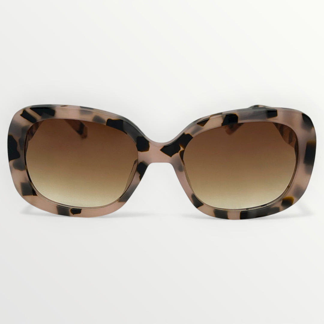 Sunglasses with tortoiseshell frame and brown gradient lenses on a white background