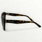 Sunglasses with tortoiseshell frame on a white background