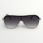 Sunglasses with a black gradient lens and gold frame on a white background