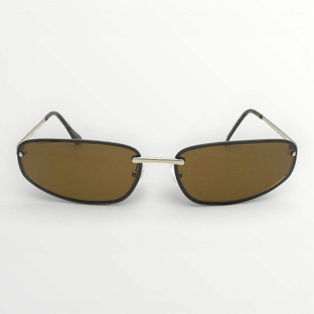 Sunglasses with gold frame and brown lenses on a white background