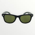 Black sunglasses with green lenses on a white background