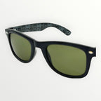 Black sunglasses with green lenses on a white background