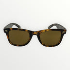 Sunglasses with tortoiseshell frame and gold lenses on a white background
