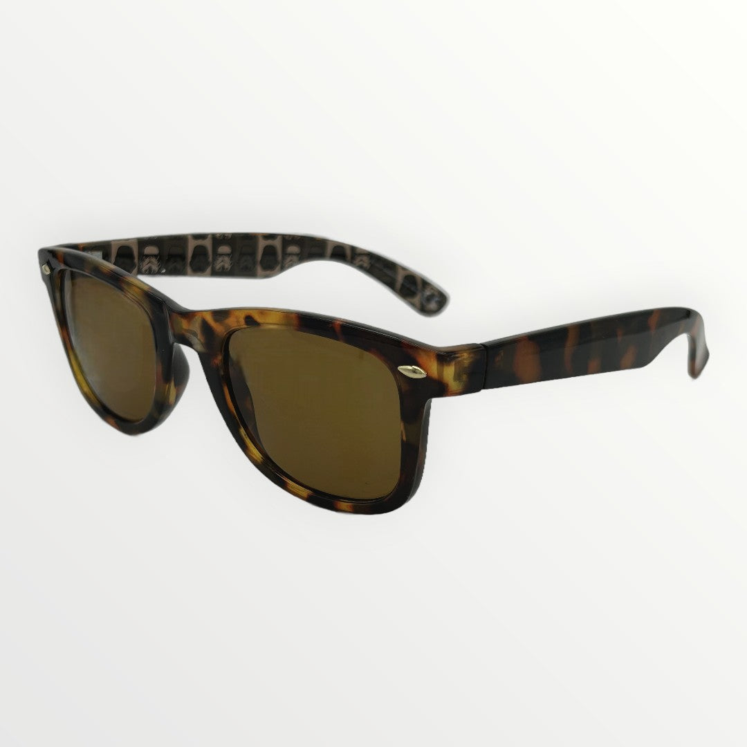 Sunglasses with tortoiseshell frame and gold lenses on a white background