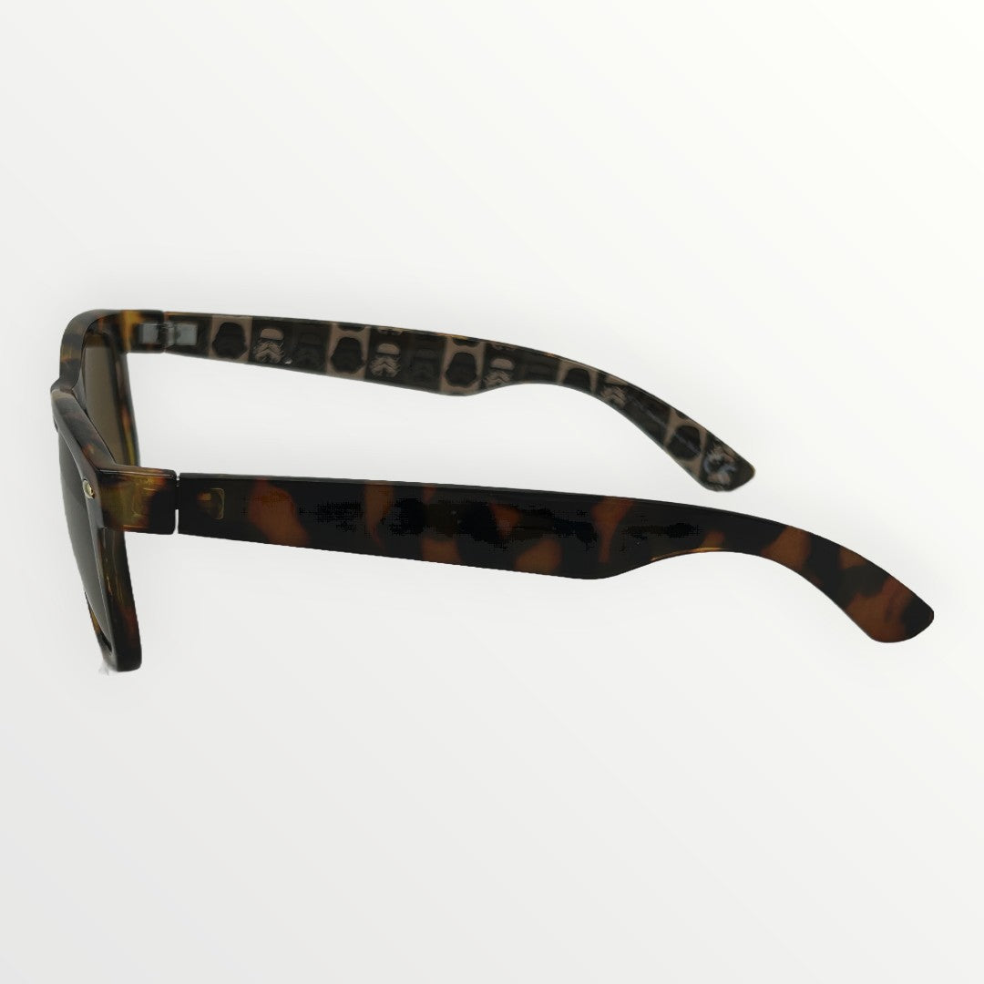 Sunglasses with tortoiseshell frame and gold lenses on a white background