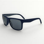Navy blue sunglasses with dark lenses on a white background