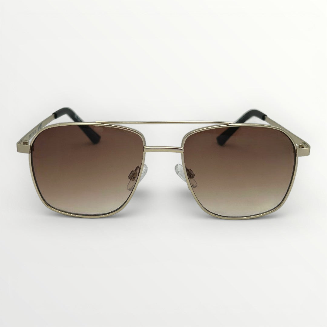 Gold-framed sunglasses with brown gradient lenses on a white background