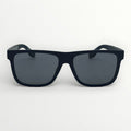 Black sunglasses with dark lenses on a white background