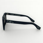 Black sunglasses with 'The Best' branding on a white background